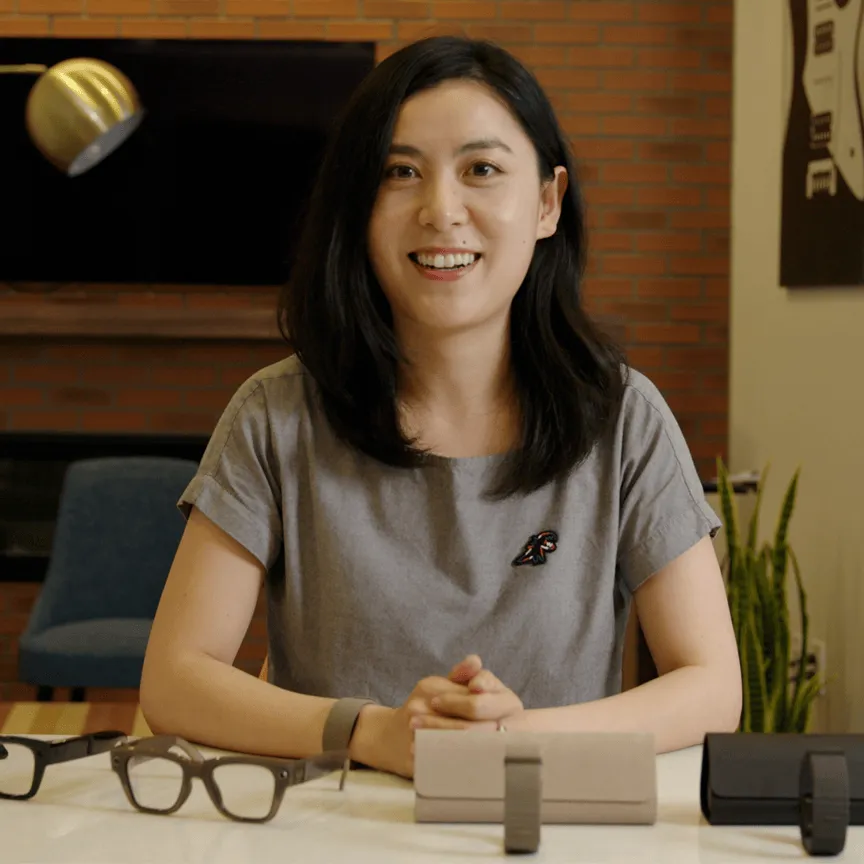 A woman sitting and speaking, representing ‘Build the products people love.’