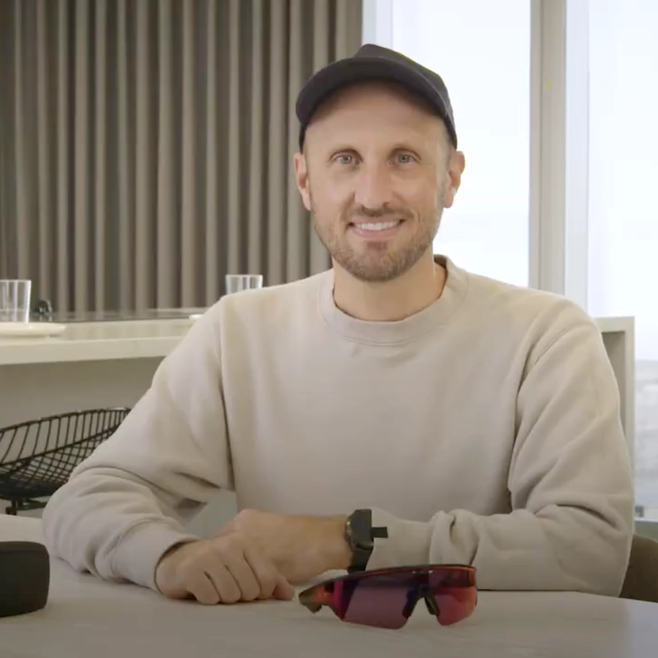 A man sitting and speaking, representing ‘Break new ground.